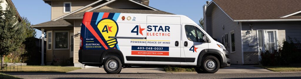 4 Star van parked on a street in front of a home.