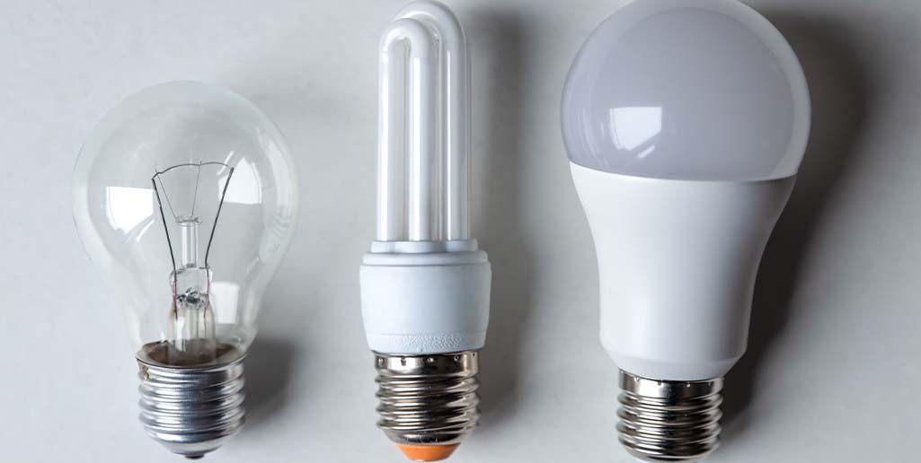 Three different lightbulbs next to each other.
