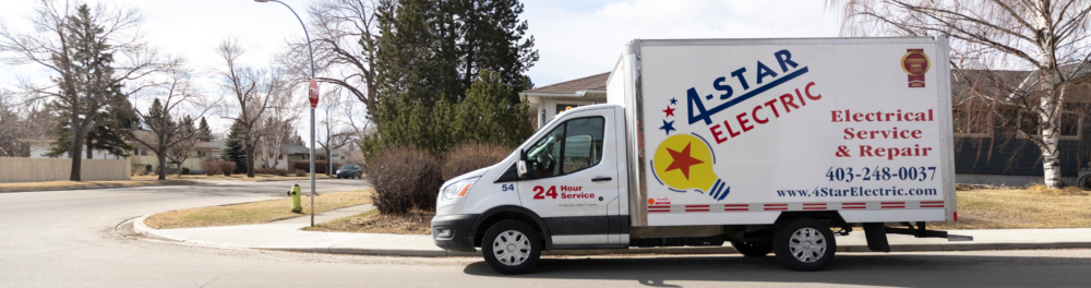 A 4-Star Electric branded truck on a residential street in the Fall. 4-Star Electric is proud to offer professional, high-quality smoke and CO detector installation. This image introduces the following section about our installation process.