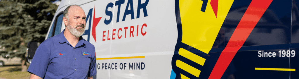 A 4-Star Electrician arrives on the job. He walks by a branded service van.