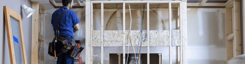 A 4-Star Electric Electrician carefully runs new wire during a home renovation. The 4-Star team can help with all electrical work during and after a home renovation to ensure safety and efficiency.