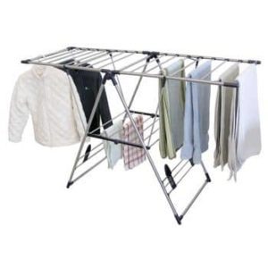 Clothes rack with towels and sweaters