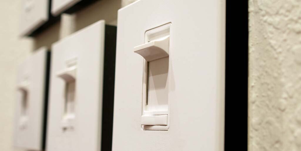 Closeup of slide dimmer switch.