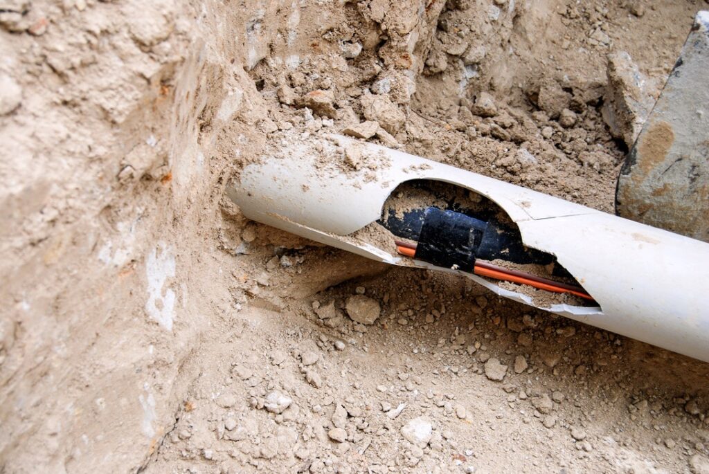 Damaged electrical wiring underground to show dangers from digging on property without contacting utility company