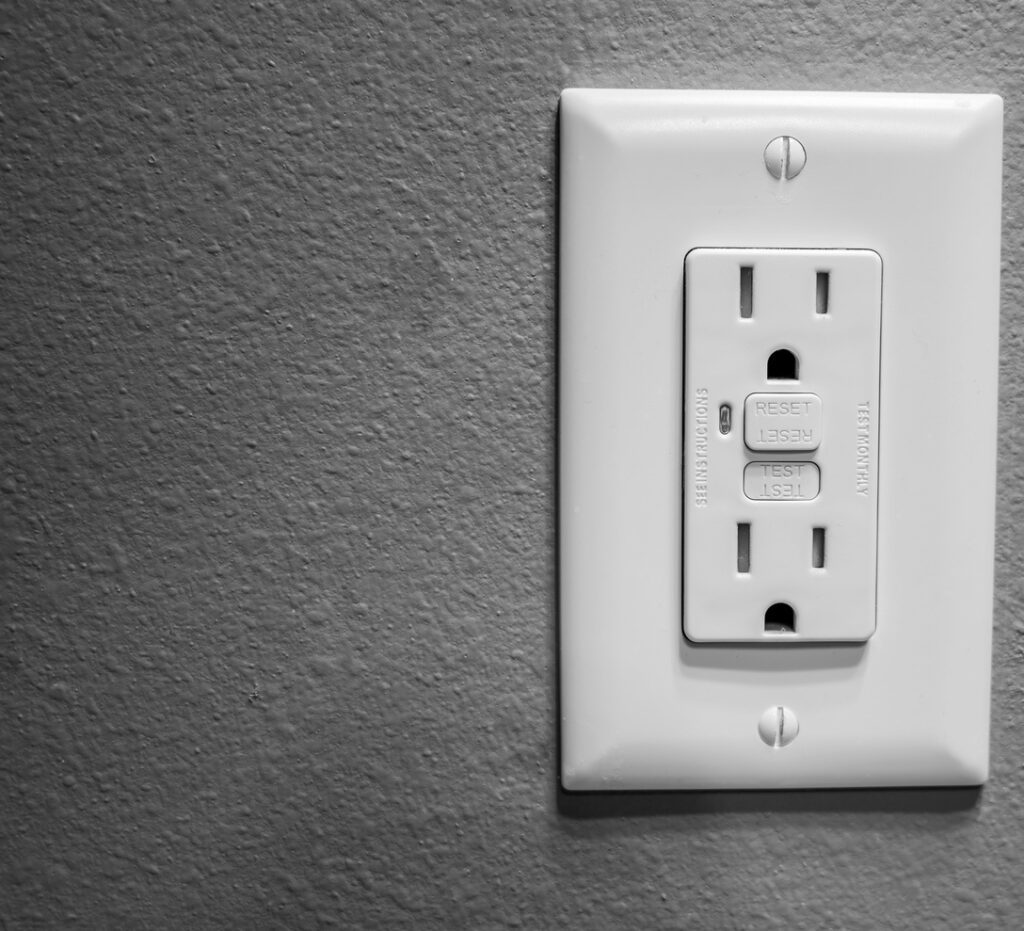 GFCI outlet on bathroom wall